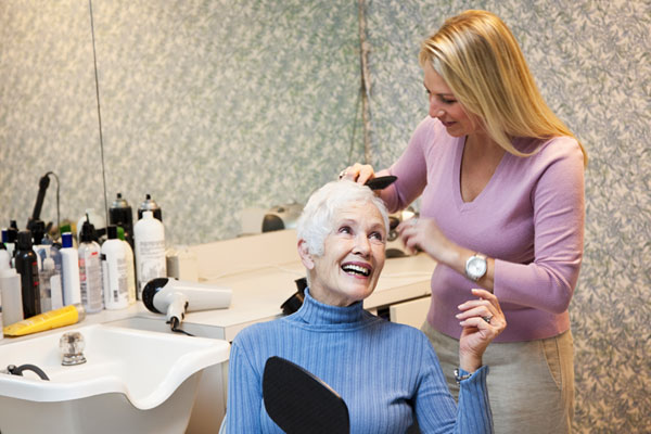 woman getting her hair done